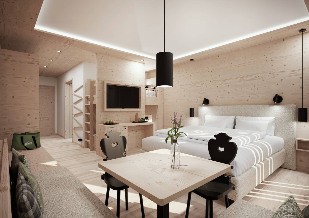 Familienzimmer mit Etagenbett und Eckbank im Familienhotel Gorfion Liechtenstein